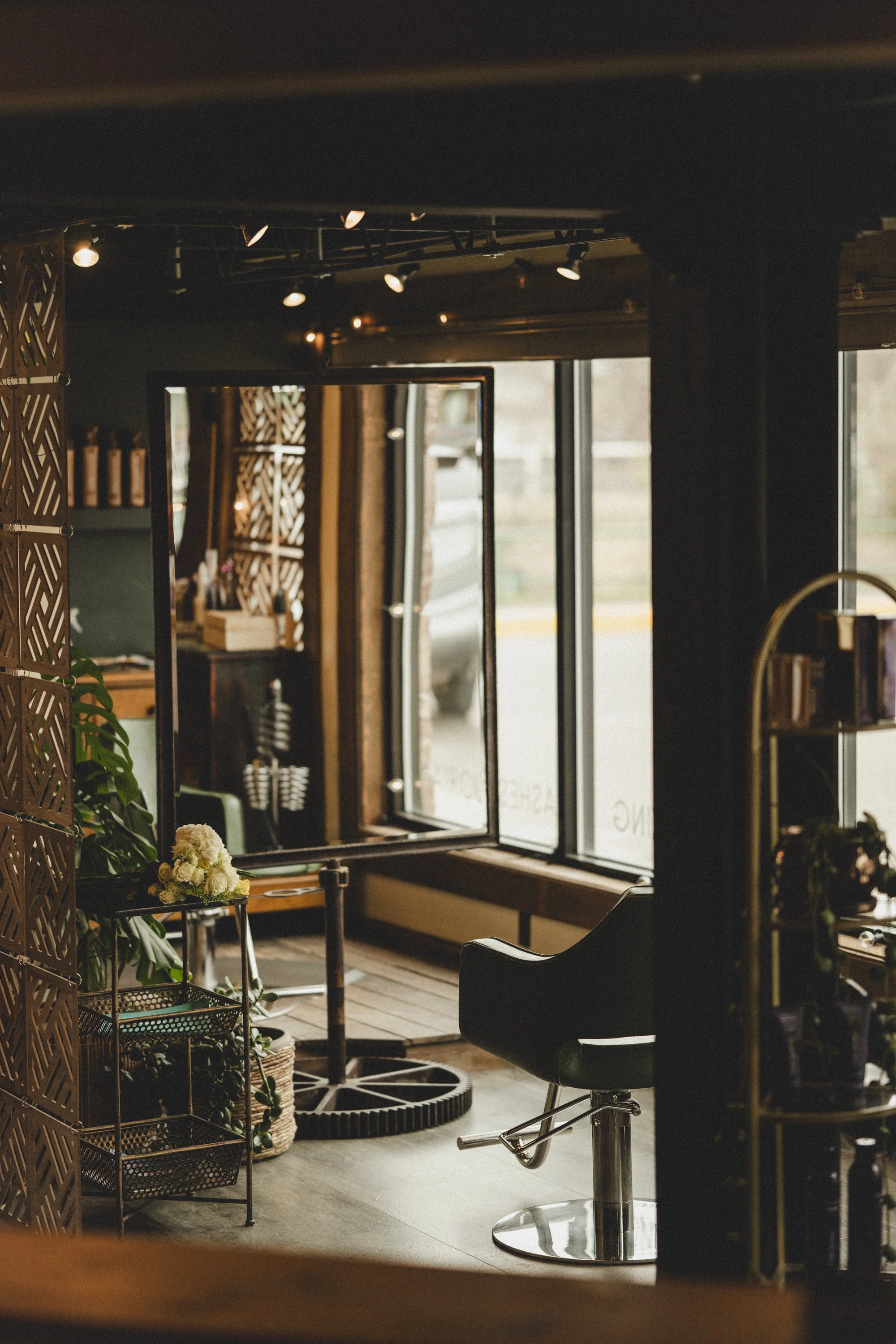 Interior of Pura Vida Salon and Spa in Livingston, Montana, showing a warm and inviting styling area